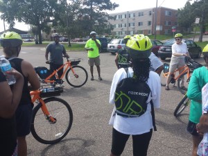 Walter, a leading member of Major Taylor, talks with the crowd about ride safety.